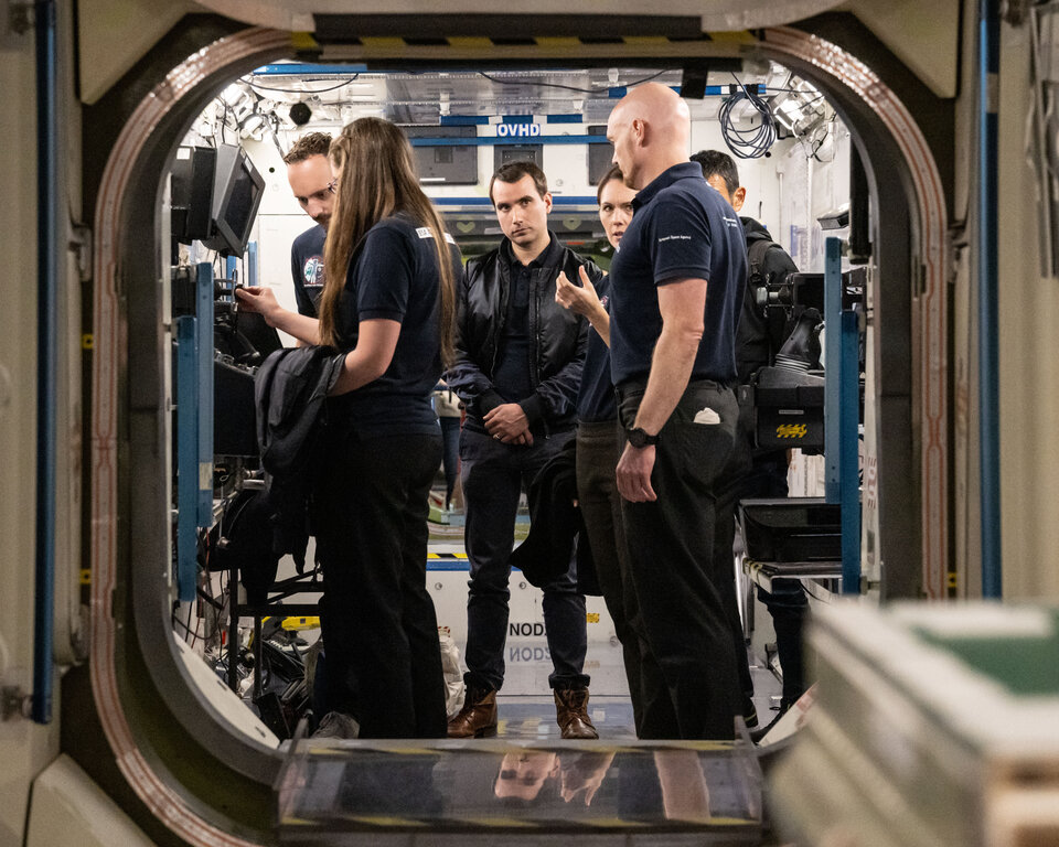 ESA astronaut candidates inside the Space Station mock-up at NASA's Johnson Space Centre